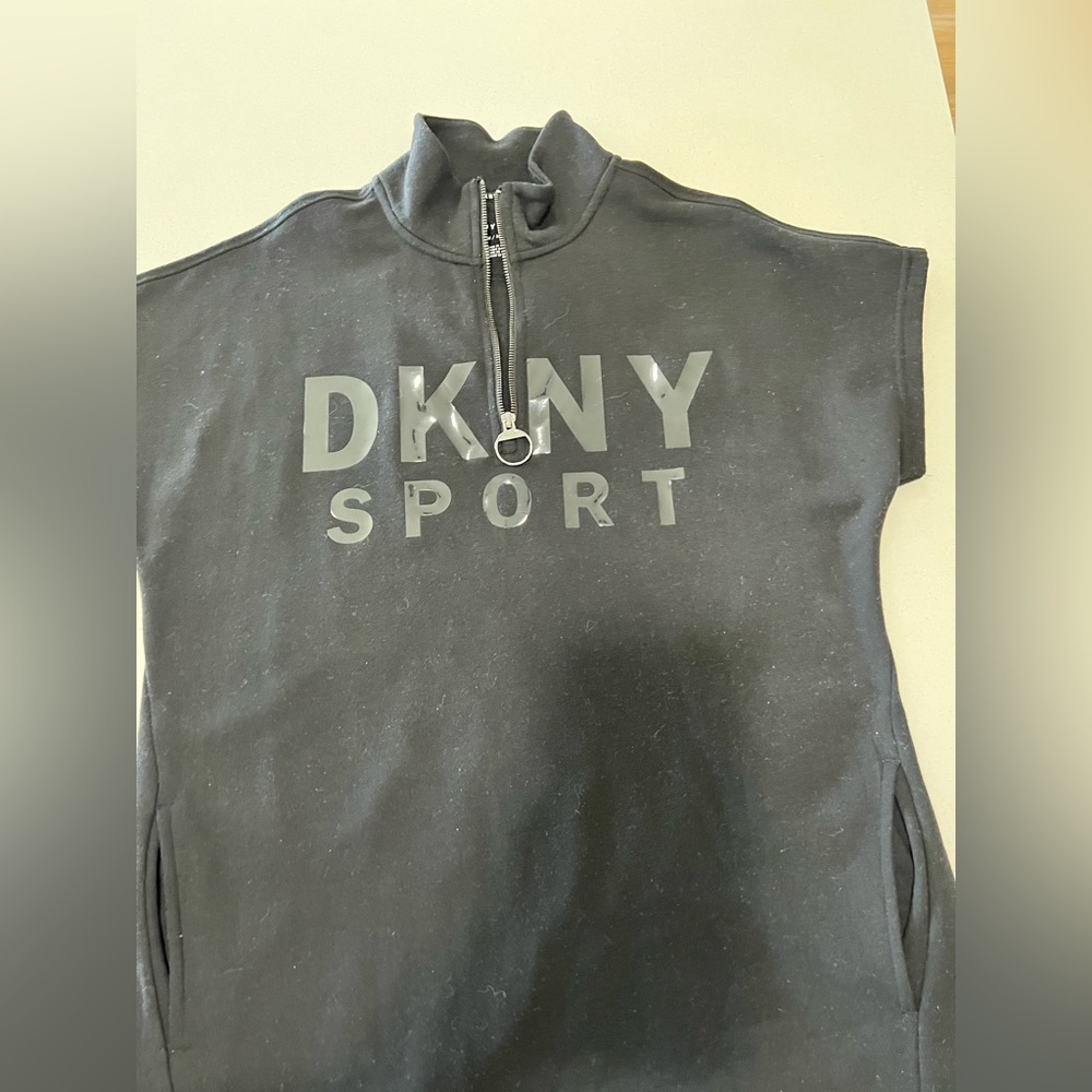 Woman all black DKNY sweater cotton dress. Like new worn only once.
